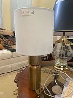 Full view of lamp with shade on table