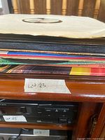 Stack of vinyl LPs showing spines