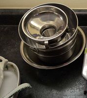 Stacked stainless bowls showing varying diameters