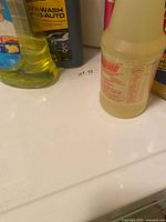 Group of cleaning bottles on surface