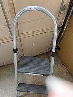 Front view of Cosco 2-step ladder showing overall structure