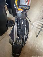 Full view of Dunlop bag with clubs and headcovers