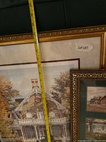 Close view of autumn house print with measuring tape and part of collage