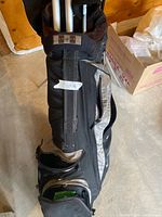 Full view of Nike golf bag standing upright