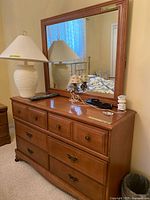 Front view of dresser with attached mirror