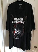 Full view of Black Sabbath Paranoid t-shirt hung on door