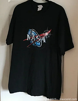 Front view showing NASA logo graphic and overall shirt condition