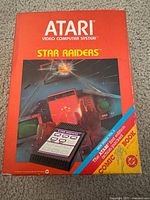 Front of Star Raiders retail box showing Atari branding