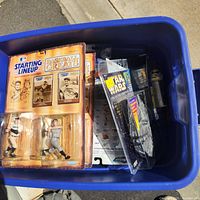 Overview of bin with Starting Lineup Baseball Greats packs visible