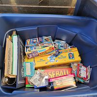 Overview of tote showing multiple card boxes and loose cards