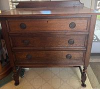 Oak three-drawer chest front view