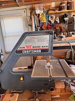 Left side view of Sears Craftsman 10" band saw on workbench