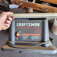 Front view of Craftsman oscillating spindle sander showing branding and power switch