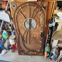 Full view of plywood board with mounted track