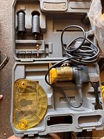 Router/spiral saw in case with handles, baseplate and cord