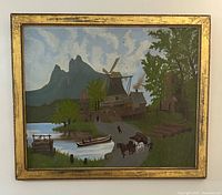 Full front view of the framed oil painting displaying scenic landscape with windmill, horse cart, canoe, water, and distant mountains.