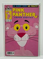 Front cover of the Pink Panther Super Special #1 comic book in a clear protective bag with board backing, showing Pink Panther face artwork.