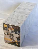 Large stack of 1993 Leaf NHL hockey cards sealed together, showing general lot size and condition.