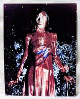 Full image of the signed photo showing Sissy Spacek covered in blood from Carrie movie with signature.