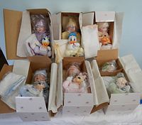 All six dolls in Ashton-Drake boxes, packed with tissue and plastic