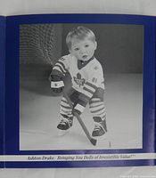 Front of promotional booklet showing doll in uniform