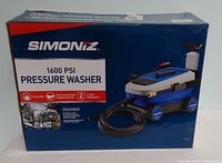 Retail box front showing Simoniz 1600 psi pressure washer details