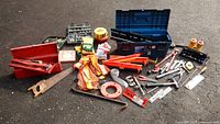 Overall view of all tools, toolboxes, safety gear laid out