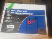 Photo of box labeling Metal 3 Spinner Target, showing features and intended use