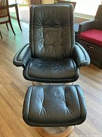 Front view of chair and ottoman set