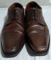 Top view of both shoes showing uppers, lacing and toe condition