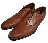 Oblique view of both shoes showing uppers and laces