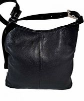 Front view of black pebbled leather Roots shoulder bag