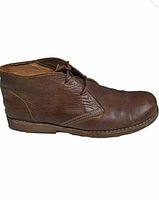 Left side profile of one boot showing leather texture and outsole