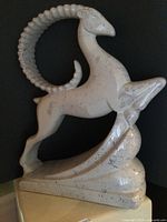 Front view of ceramic gazelle statue showing overall form