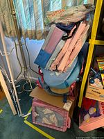 Stack showing Eeyore backpack, miniature backpack, packaged doll clothes