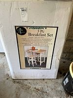 Front of sealed box showing product image and specs