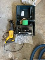DEWALT reciprocating saw and Hitachi circular saw in case