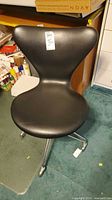 Front view of black molded rolling office chair