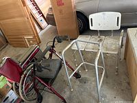 Overall view showing wheelchair, rollator, walker, shower bench