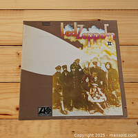 Front cover of Led Zeppelin II album showing original artwork and band name logo.