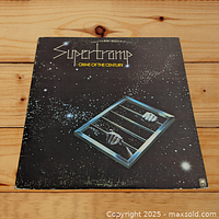 Front cover of the Supertramp Crime of the Century vinyl LP showing album artwork and Supertramp logo.