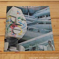 Front cover of Alan Parsons Project I Robot vinyl LP showing robot and architectural design.