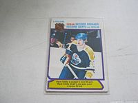 Front view of Wayne Gretzky 1979/80 OPC #3 Record Breaker hockey card showing Gretzky in Edmonton Oilers uniform with a purple and white border, highlighting his achievement as youngest 50-goal scorer.