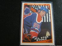 Front of the Wayne Gretzky 1983/84 OPC hockey card showing player photo, uniform, and All Star designation.