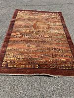 Full view of the Couristan Mirage Decorwool area rug showing the design and coloring.