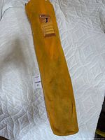 Orange camp chair carry bag showing branding and color