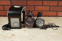 Lot of 3 vintage audiophile headphones with Jecklin Float Model 2 left headphone unit and its housing visible, alongside Beyerdynamic DT-990 and Sony MDR IF-610 headphones.