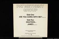 Back cover of Pat Metheny Group vinyl record showing track listing and promotional text including 'PROMOTIONAL COPY NOT FOR SALE' and production credits by Manfred Eicher.