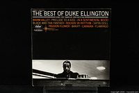 Front cover of Duke Ellington The Best Of jazz LP showing title, track list and artist photo.