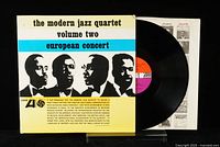 Front and disc of the The Modern Jazz Quartet European Concert Volume Two vinyl LP showing cover design, band member profile silhouettes and Atlantic label on disc.